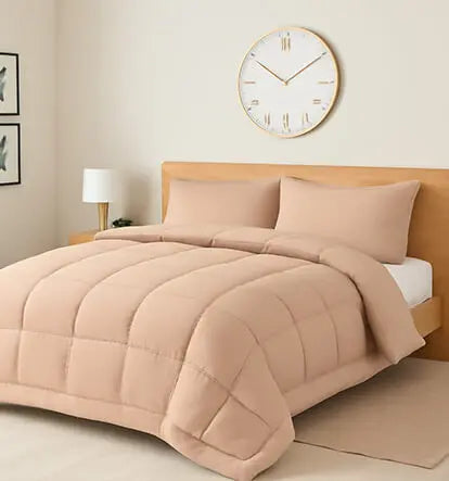 Minimalist bedroom featuring a peach-colored comforter set on a wooden bed with a wall clock above